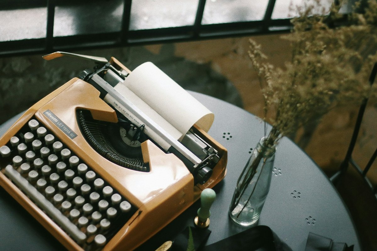 A typewriter with a page loaded mid-sentence