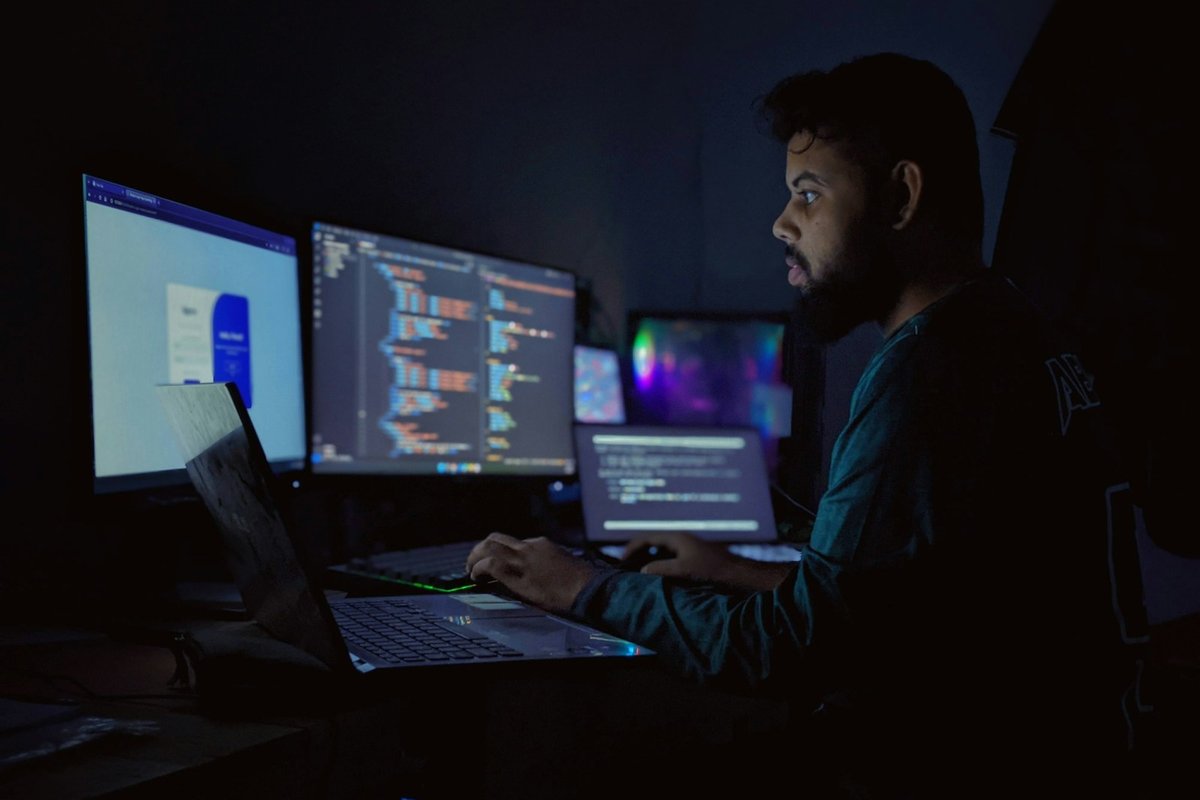 An operator keeping watch over systems at night